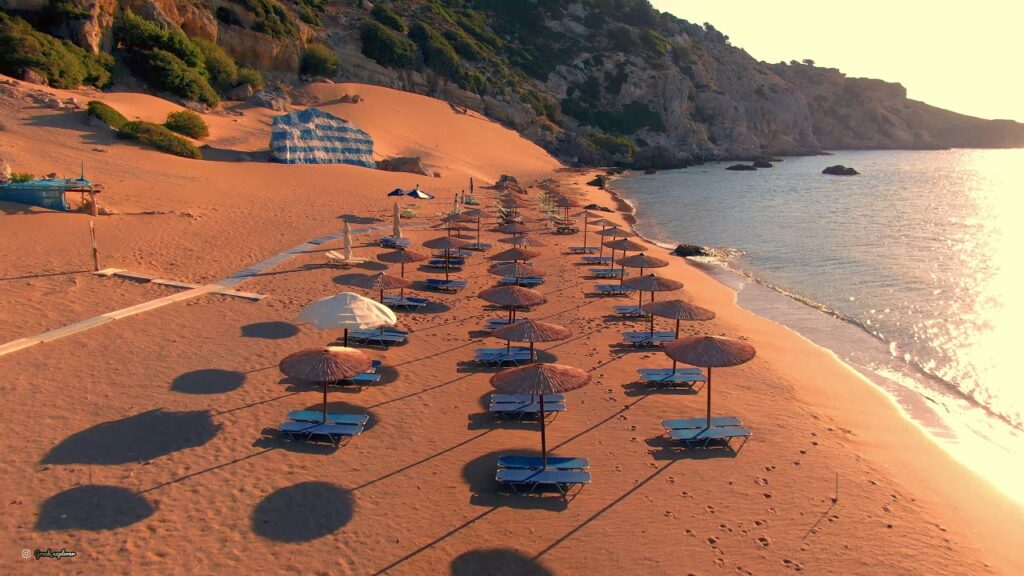 Umbrellas on the golden sand of Tsambika Beach