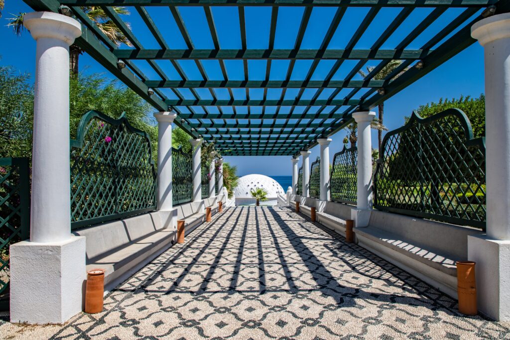 Pergola walkway with mosaic floor at Kalithea Springs